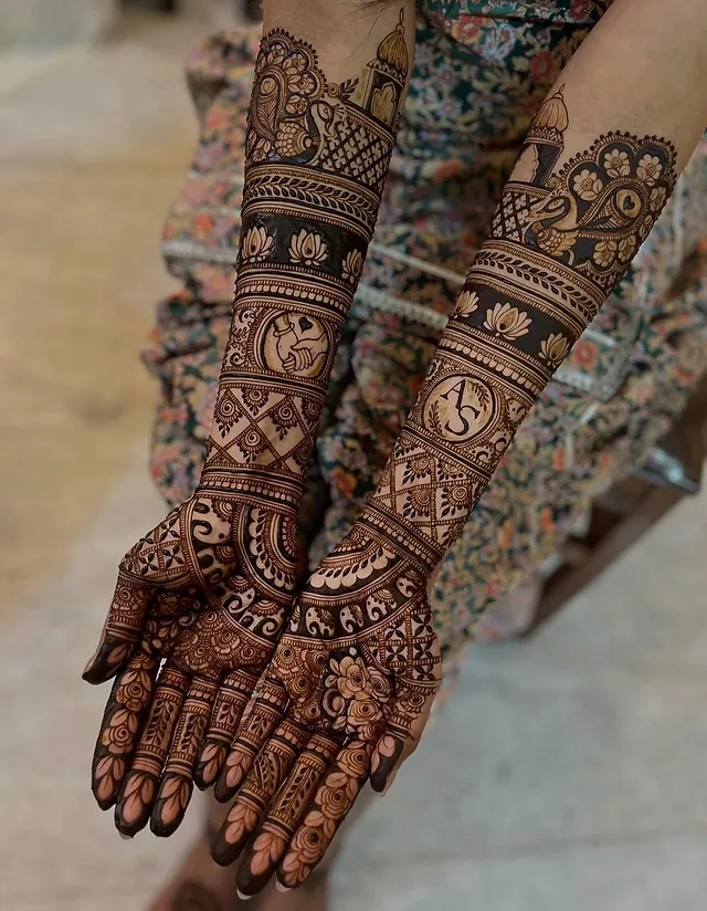 Full bridal mehndi from fingertips to elbows with detailed panels
